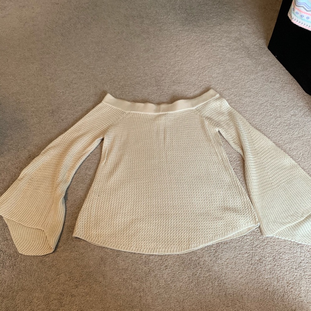 Off the shoulder tan shirt